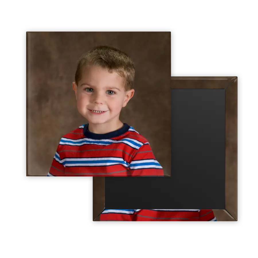 Square custom photo magnet featuring a centered portrait of a young child, shown with its magnetic back