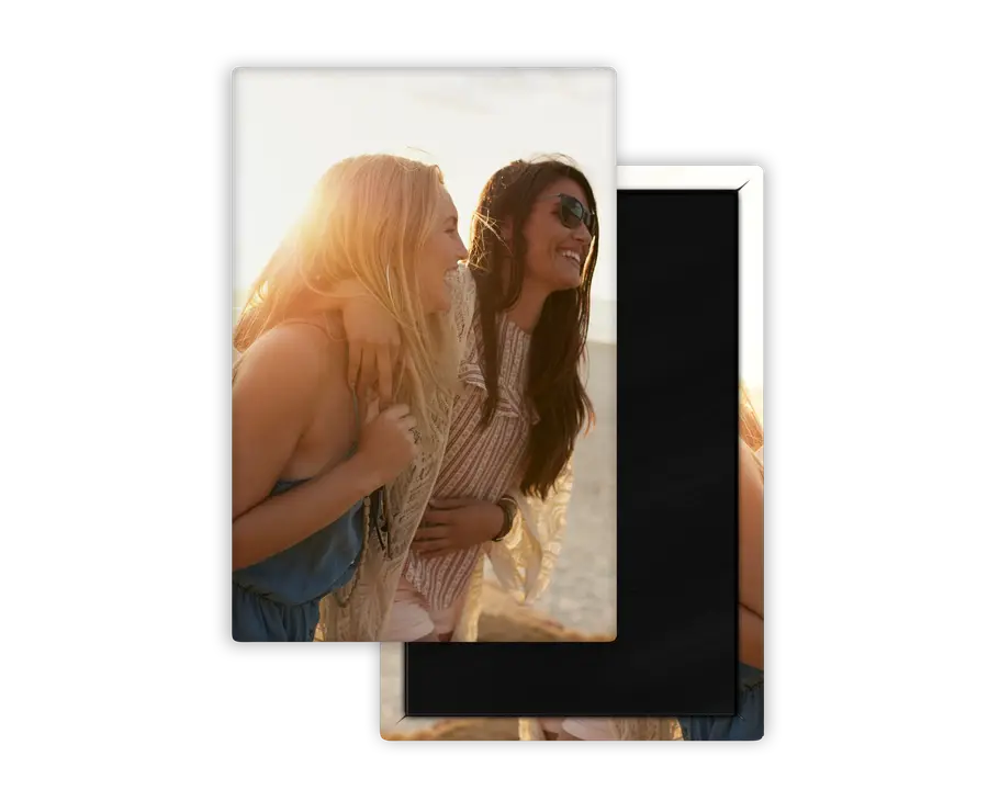Rectangular custom photo magnet featuring two friends in a portrait composition, shown with its magnetic back